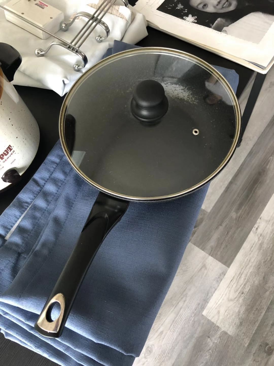 Blue curtain and the pan.jpg